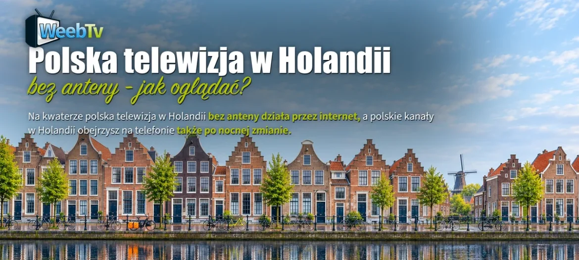Rząd holenderskich kamienic nad kanałem z rowerami, dachy bez anten satelitarnych
