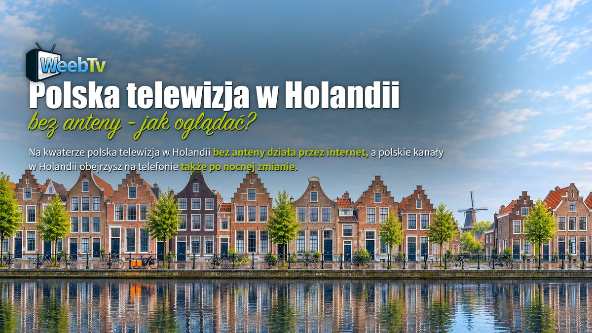 Rząd holenderskich kamienic nad kanałem z rowerami, dachy bez anten satelitarnych